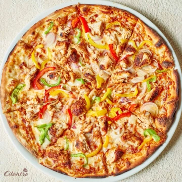 Celeberate the good taste of Butter Chicken Pizza with our special ones